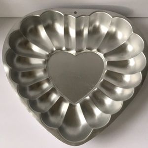 Vintage metal heart shape baking mold